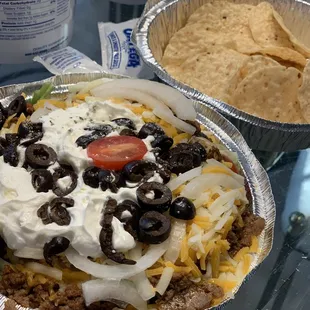 The taco salad is huge and delicious!!! Comes with Tortilla chips