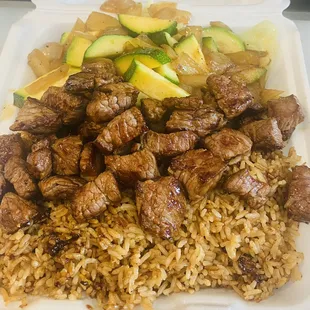 Steak Hibachi: $10.99 Zucchini and Onions are 1$ each.