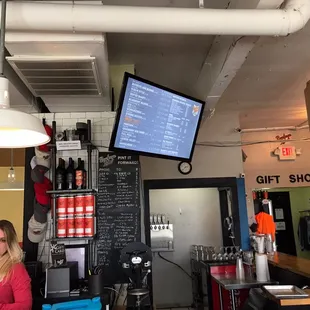 a woman sitting at the bar