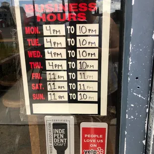 a business hours sign