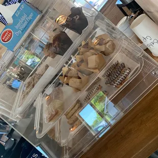 a display of coffee and pastries