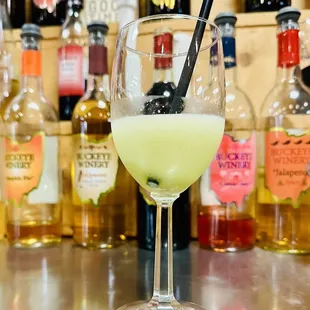 a glass filled with a drink