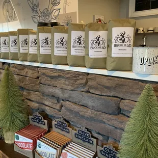 a display of coffee bags and christmas trees
