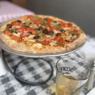 a glass of beer on a table