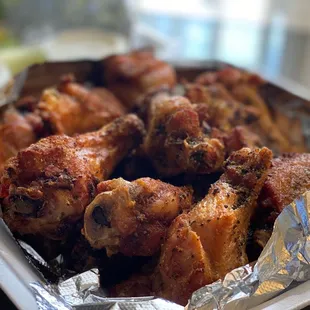 a plate of chicken wings