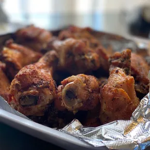 a plate of chicken wings