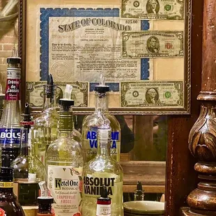 This is behind the bar upstairs ( a copy of the Number One liquor licence in Denver.