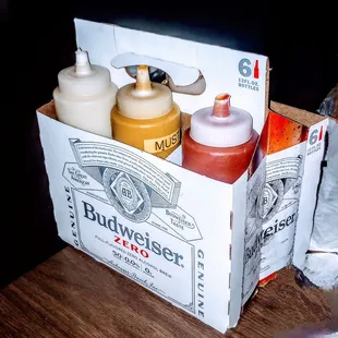 Condiments are served in this fun unique way. 1 side basic toppings 2nd side more toppings like thousand Island dressing.