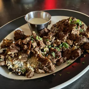 Braised tenderloin over portobello mushrooms