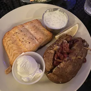 salmon w/ garlic dill sauce and loaded baked potato, peppercorn ranch starter salad- both very good