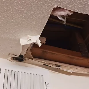 Black moled and has been open like this for two weeks.