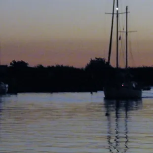 sail boat coming in from a hot July 3 day on the river