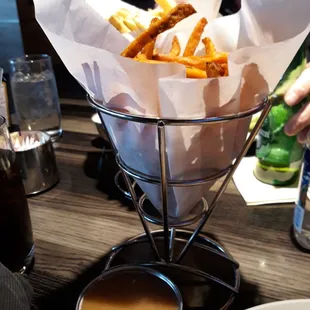 Sweet potato fries and thick maple-based dipping sauce; NOT offered at Buckman's but should be