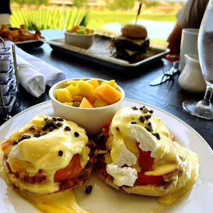 two eggs benedicts on a plate