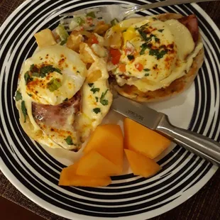 Take-out Eggs Benedict did NOT come with the cantaloupe.  EXCELLENT!  Maybe the only excellent dish I've ever had here in 17 years!