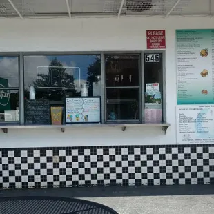 Prices are on the pink sheet by the window on the right