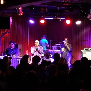 a band performing on stage