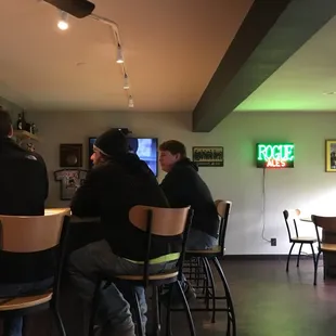 people sitting at a bar