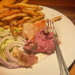 RAW BEEF in a burger that was ordered medium (not medium rare)
