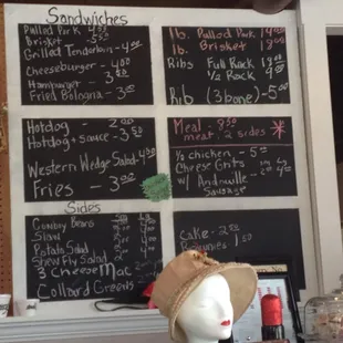 The menu board. You can see Red Velvet cake in the cake display.