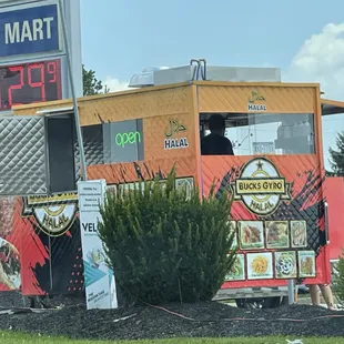 Cart is at a sunoco gas station