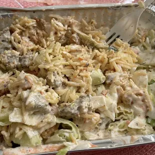 chicken and lamb over rice and salad mixed