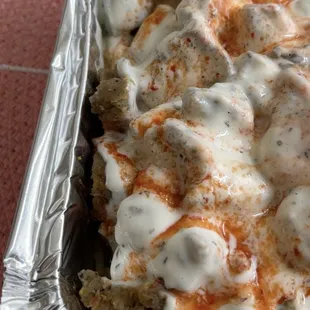 chicken and lamb over rice and salad