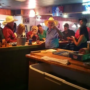 a group of people in a restaurant