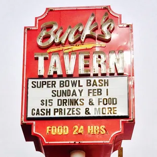 a neon sign for a restaurant