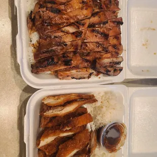 two trays of chicken and rice