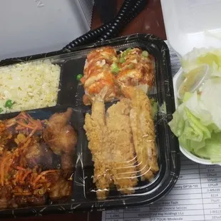 HUGE Bento box with spicy chicken. Amazing! I got about 4 meals out of this