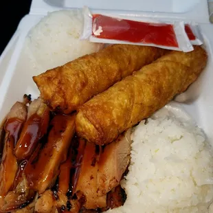 Chicken teriyaki with egg rolls rice and a side salad. Yum!