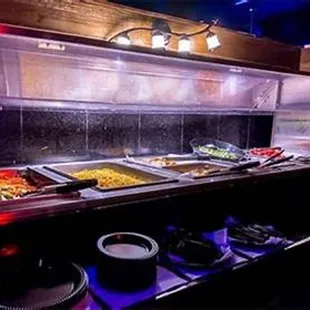 a buffet with a variety of food