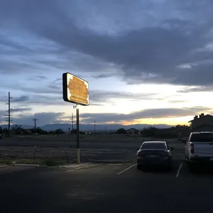 Sunset with outdoor sign