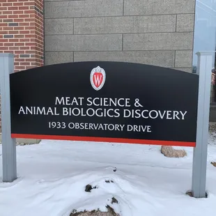 a sign for a meat science and animal biology discovery