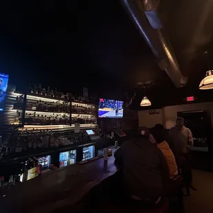 people sitting at the bar