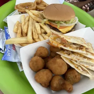 Quesadilla, fried mushrooms, onion rings, burger fries