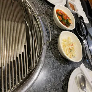 Some side dishes and grill. Ready to start
