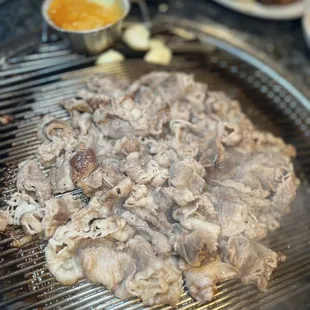 meat cooking on a grill