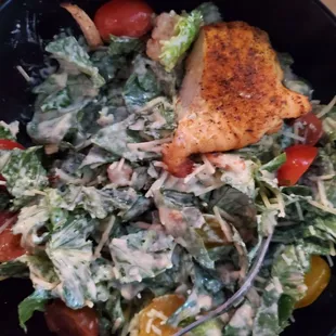 Half ceasar salad with blackened salmon