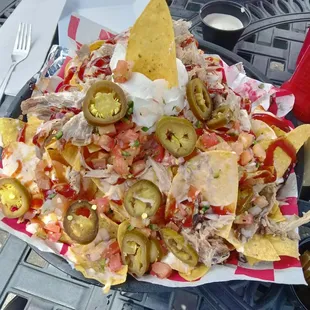 This is a pulled pork nacho, me and my buddy almost ordered 2! Lol happy we didn&apos;t, it is giant! Very good and very affordable.