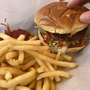 Burger, fries, and a can of Coke meal for $10.50