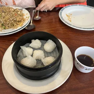 Mini shrimp dumplings and egg fried rice.