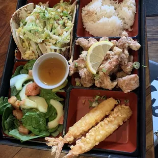 Korean tacos, rice, Japanese fried chicken Karaage, shrimp tempura, salad.