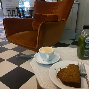 Pumpkin bread and cappuccino enjoyed in the couch area before work