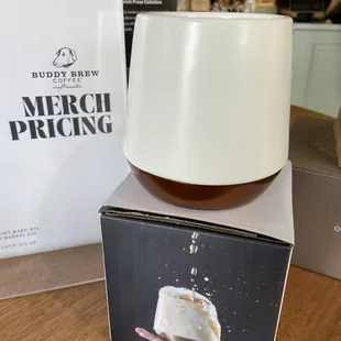 a cup of coffee on a box