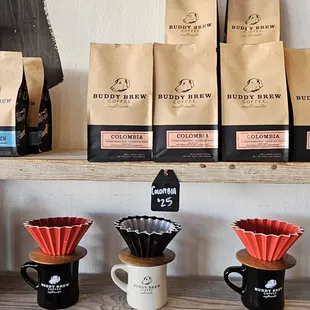 a variety of coffees on a shelf