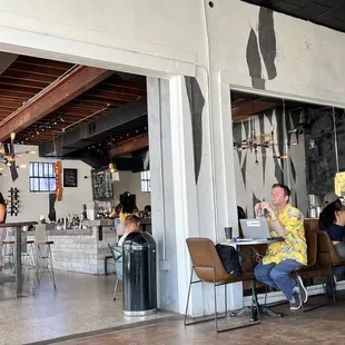 a man and woman sitting at a table