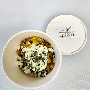 Roasted street corn with our white gold sauce