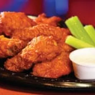 ows chicken wings with celery and ranch dressing